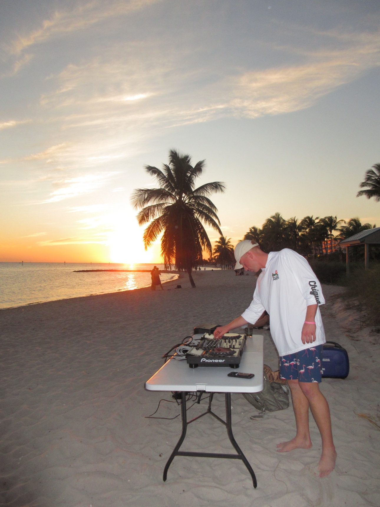 Will Andrews playing a sunset set on a Key West beach